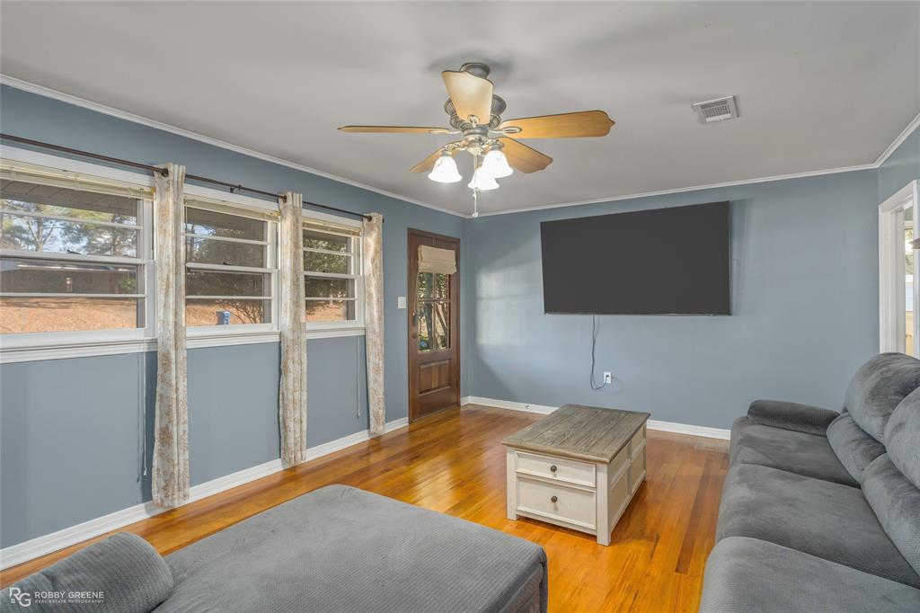 803 Drew Lane Minden, LA 71055 - Photo 4 of 33 a living room with furniture and a flat screen tv