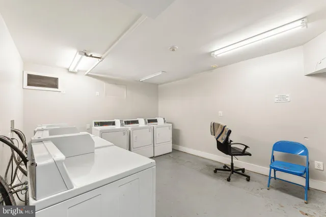 a view of a balcony with wooden floor and fence