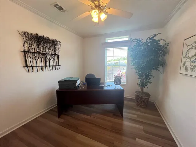 a view of a workspace with furniture