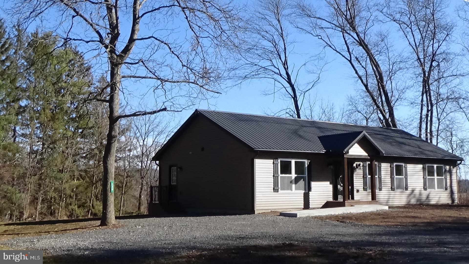 130 Soule Road New Bloomfield, PA 17068 - Photo 1 of 23 a front view of a house with a yard