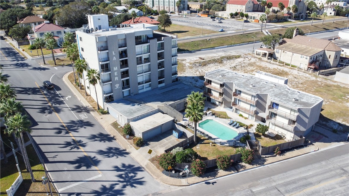 520 South Chaparral Street, Unit 204 Corpus Christi, TX 78401 - Photo 18 of 24 an aerial view of a house with a swimming pool