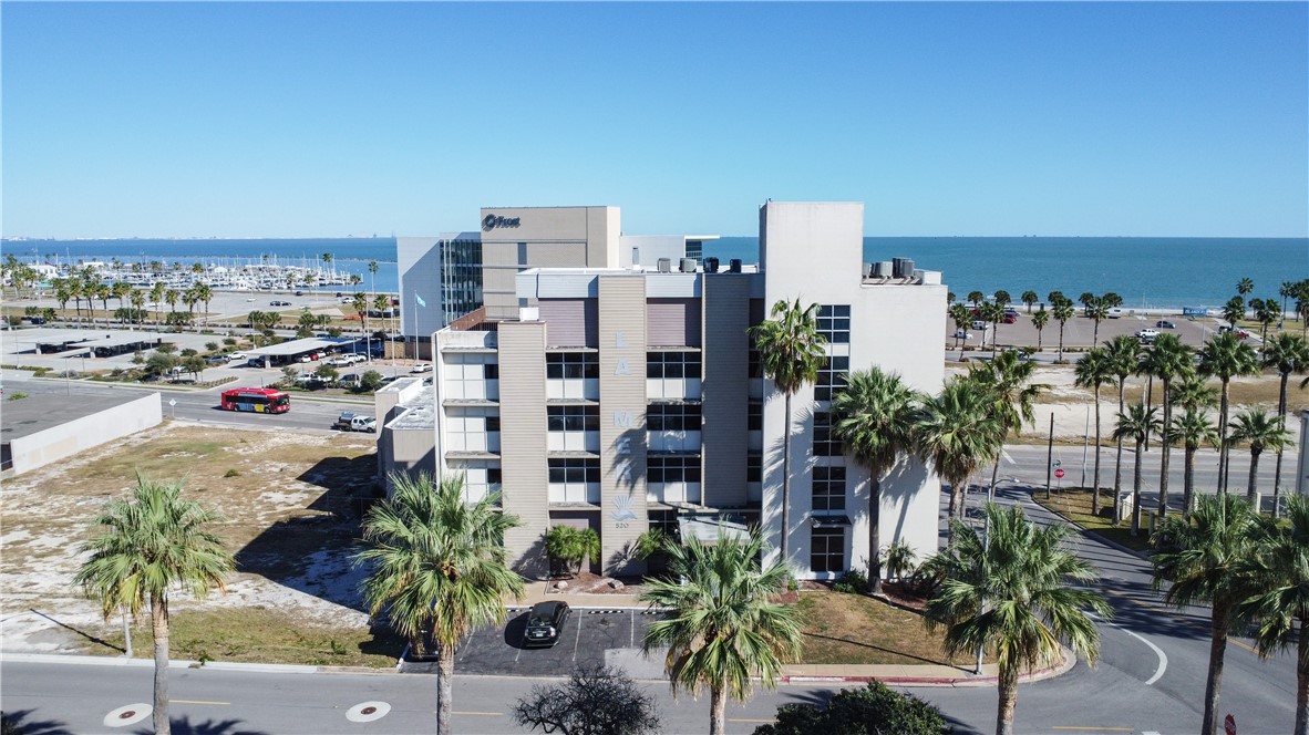 520 South Chaparral Street, Unit 204 Corpus Christi, TX 78401 - Photo 2 of 24 a city view with tall buildings