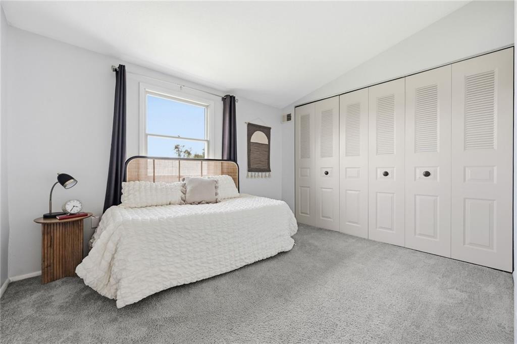 307 Hamlet Court Pittsburgh, PA 15227 - Photo 21 of 43 a bedroom with a bed and a window