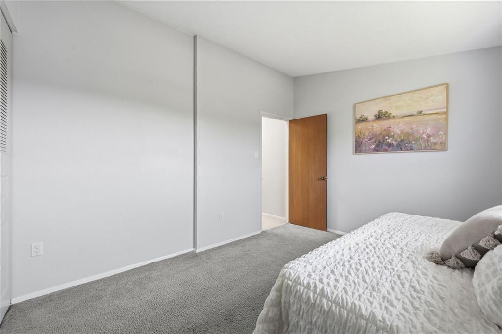 307 Hamlet Court Pittsburgh, PA 15227 - Photo 22 of 43 a bedroom with a bed and wall painting
