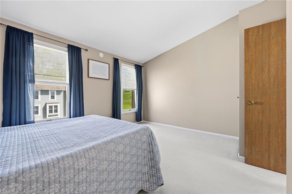 307 Hamlet Court Pittsburgh, PA 15227 - Photo 26 of 43 a bedroom with a bed and a window
