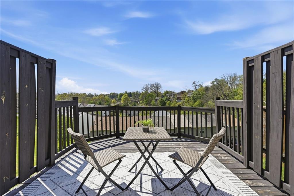 307 Hamlet Court Pittsburgh, PA 15227 - Photo 31 of 43 a view of a balcony with wooden floor and outdoor seating