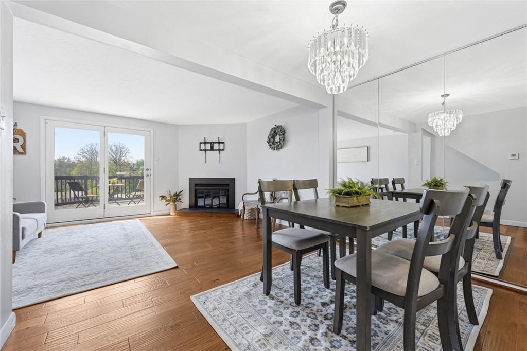 307 Hamlet Court Pittsburgh, PA 15227 - Photo 10 of 43 a view of a dining room with furniture and wooden floor