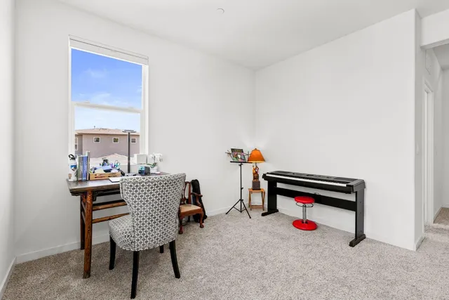 a bedroom with a bed and a cabinets