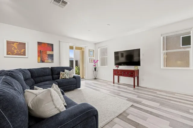 a kitchen with a refrigerator microwave and stove