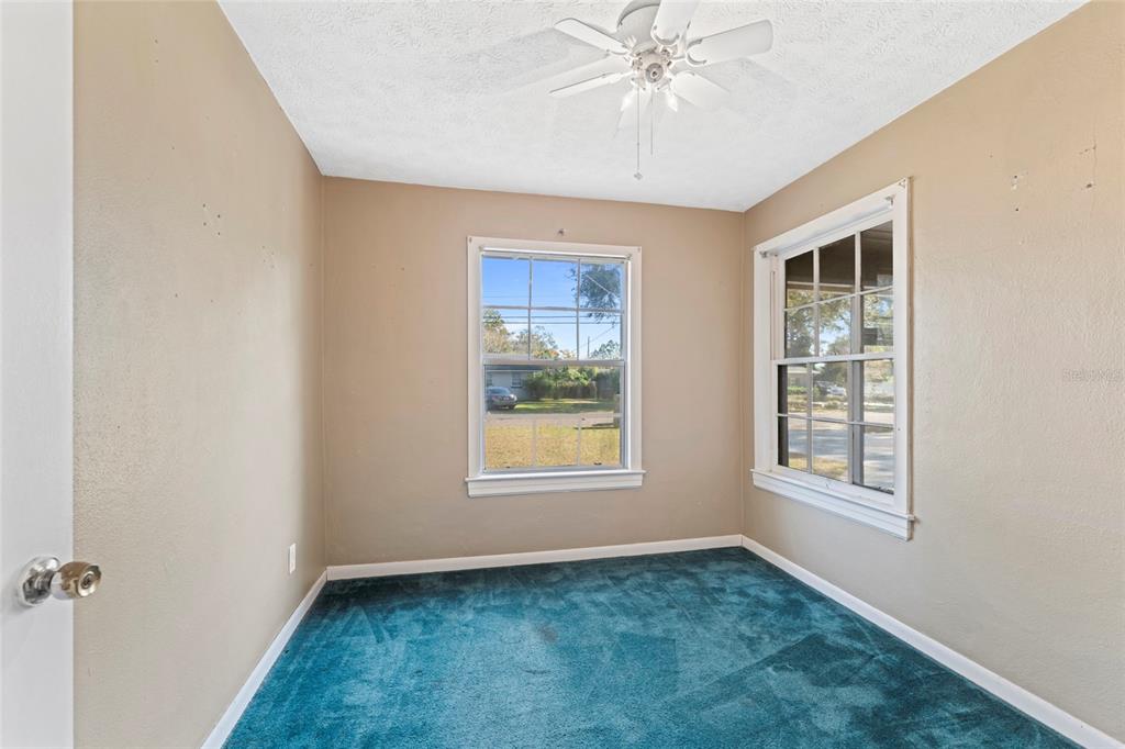 11680 Aaron Road Jacksonville, FL 32218 - Photo 17 of 26 a view of an empty room with a window