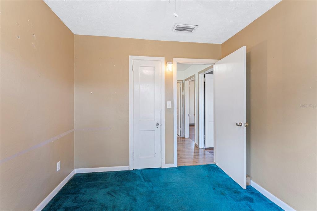 11680 Aaron Road Jacksonville, FL 32218 - Photo 18 of 26 a view of room with window and wooden floor