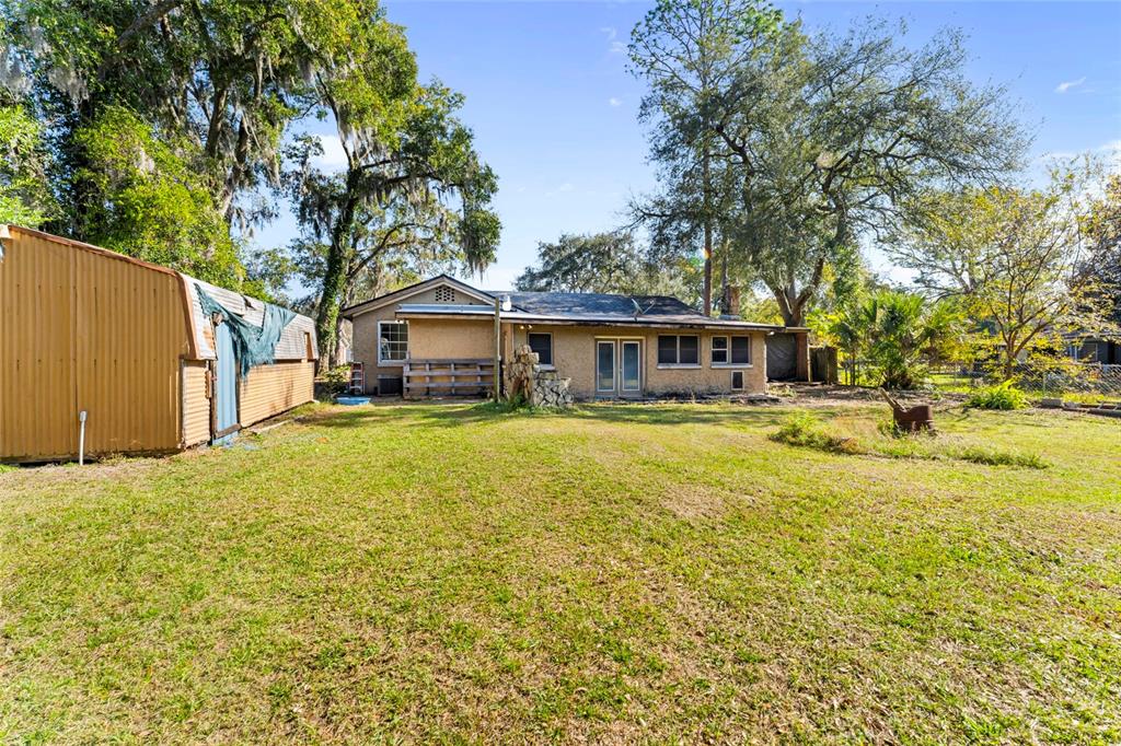 11680 Aaron Road Jacksonville, FL 32218 - Photo 26 of 26 a house view with swimming pool in front of it