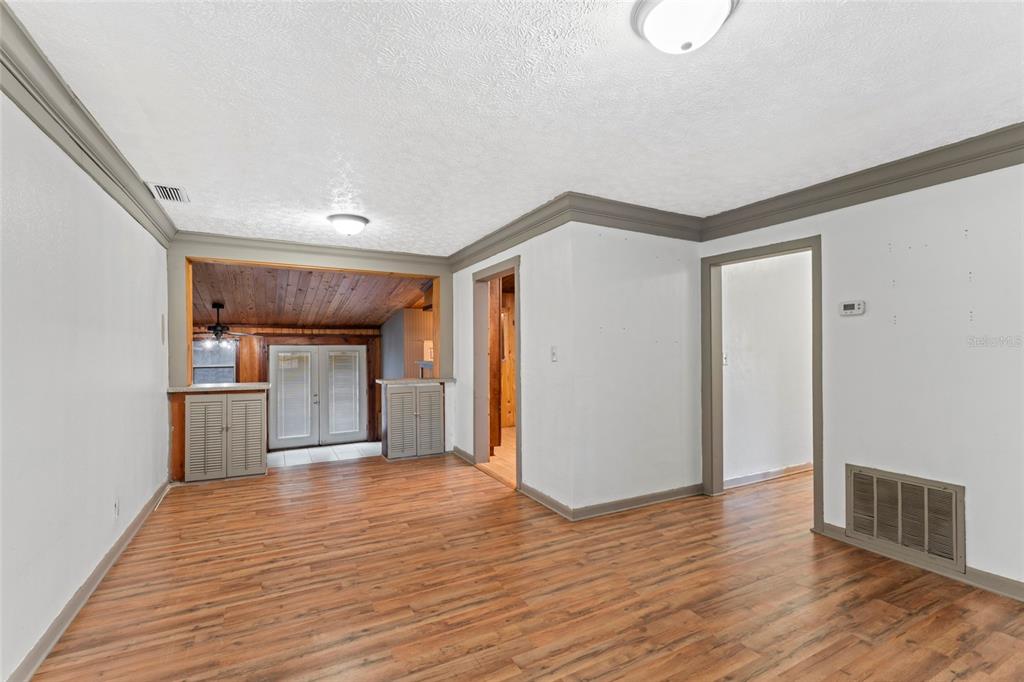 11680 Aaron Road Jacksonville, FL 32218 - Photo 6 of 26 a view of a kitchen with a sink and a refrigerator