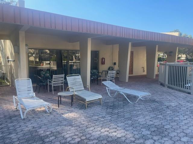 301 North Pine Island Road, Unit 110 Plantation, FL 33324 - Photo 13 of 13 a view of a house with backyard porch and sitting area