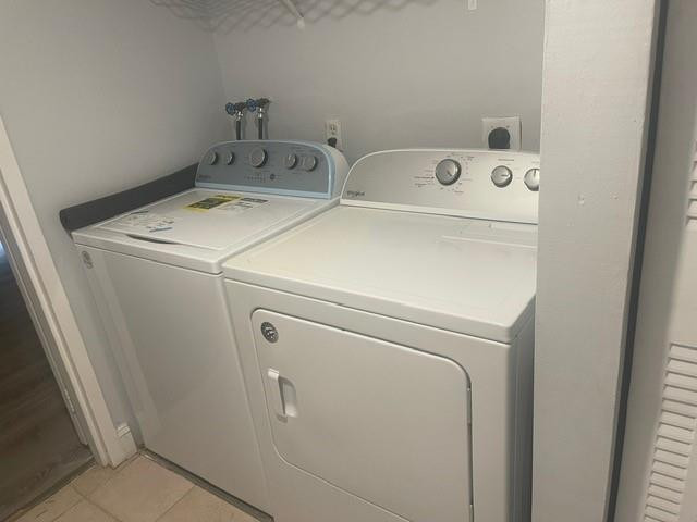 301 North Pine Island Road, Unit 110 Plantation, FL 33324 - Photo 6 of 13 a utility room with dryer and washer