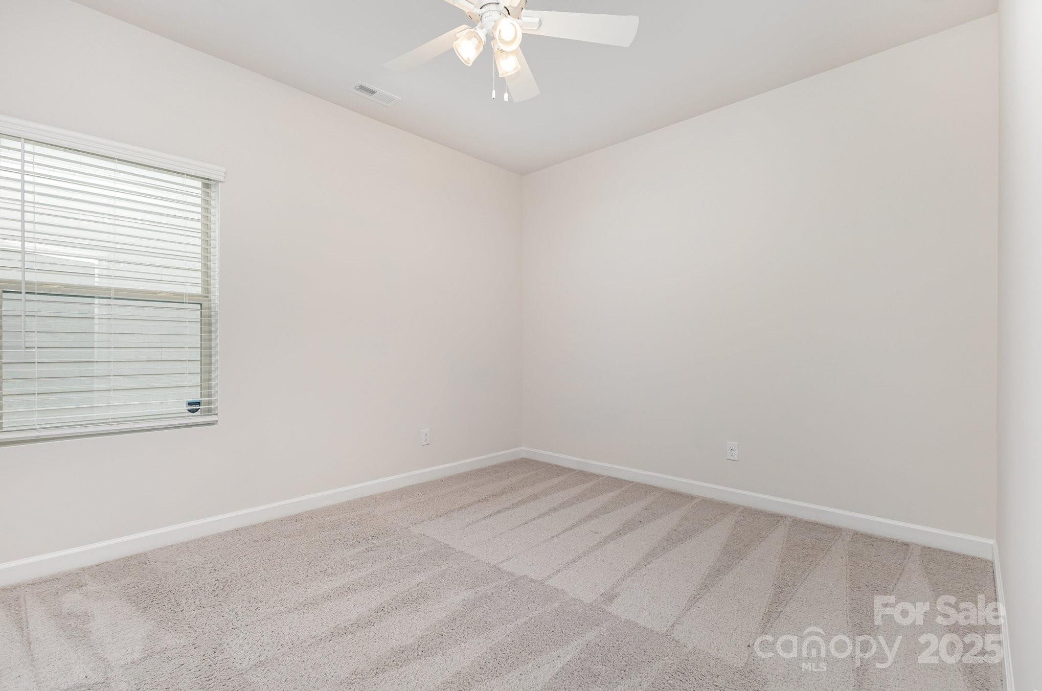 4003 Armstrong Farm Drive Belmont, NC 28012 - Photo 14 of 32 an empty room with a window