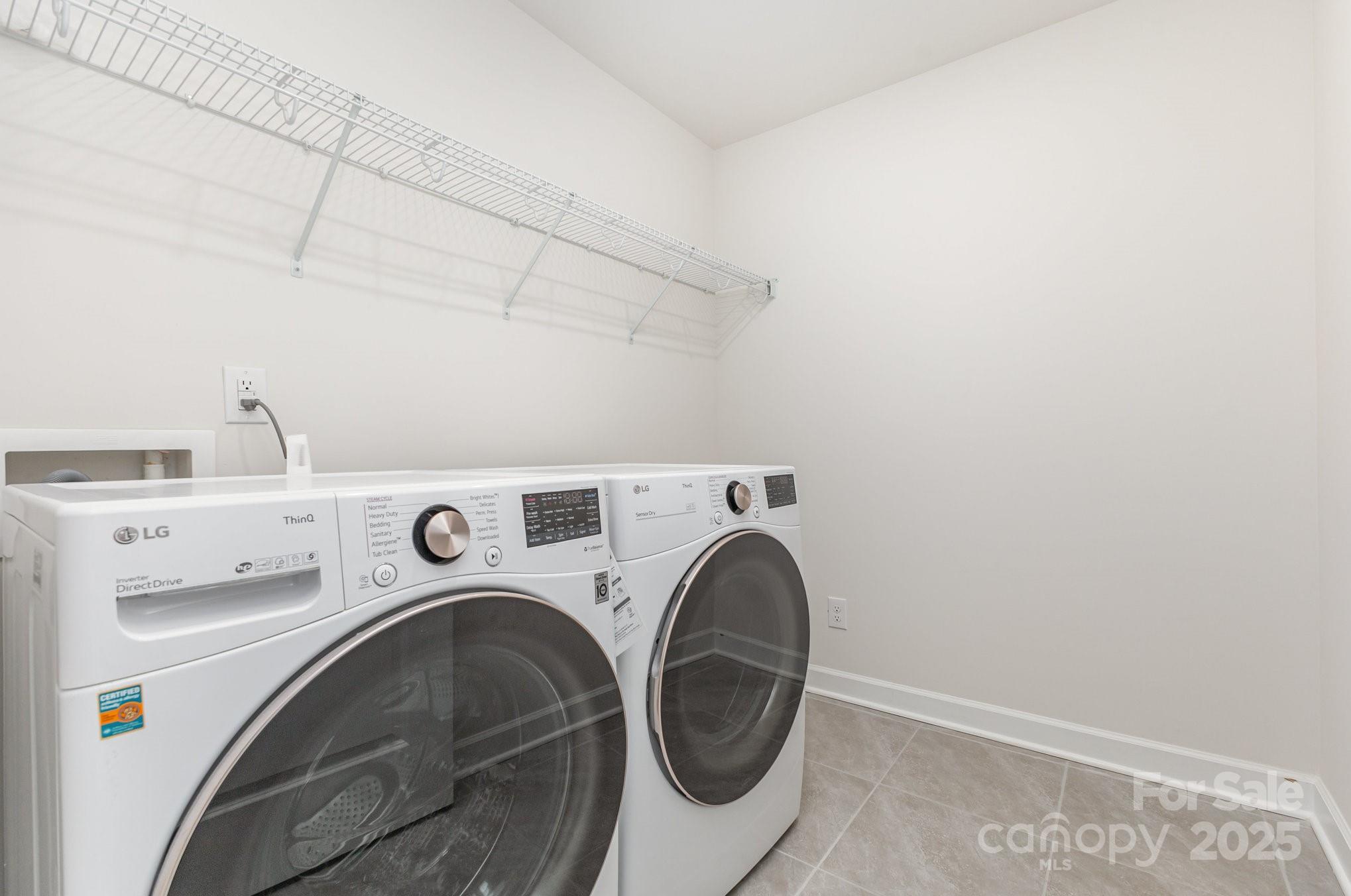 4003 Armstrong Farm Drive Belmont, NC 28012 - Photo 19 of 32 a utility room with dryer and washer