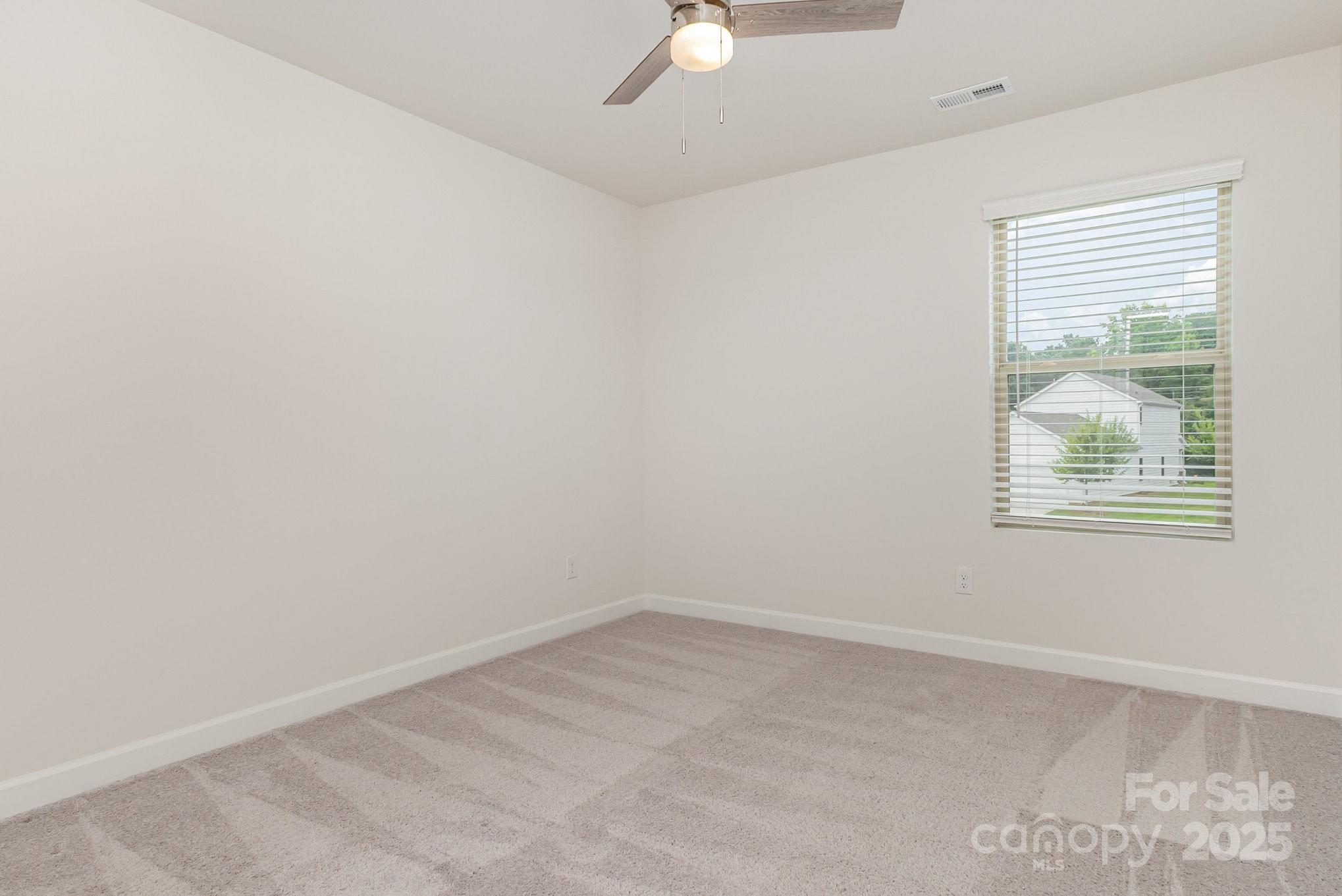 4003 Armstrong Farm Drive Belmont, NC 28012 - Photo 22 of 32 an empty room with a window