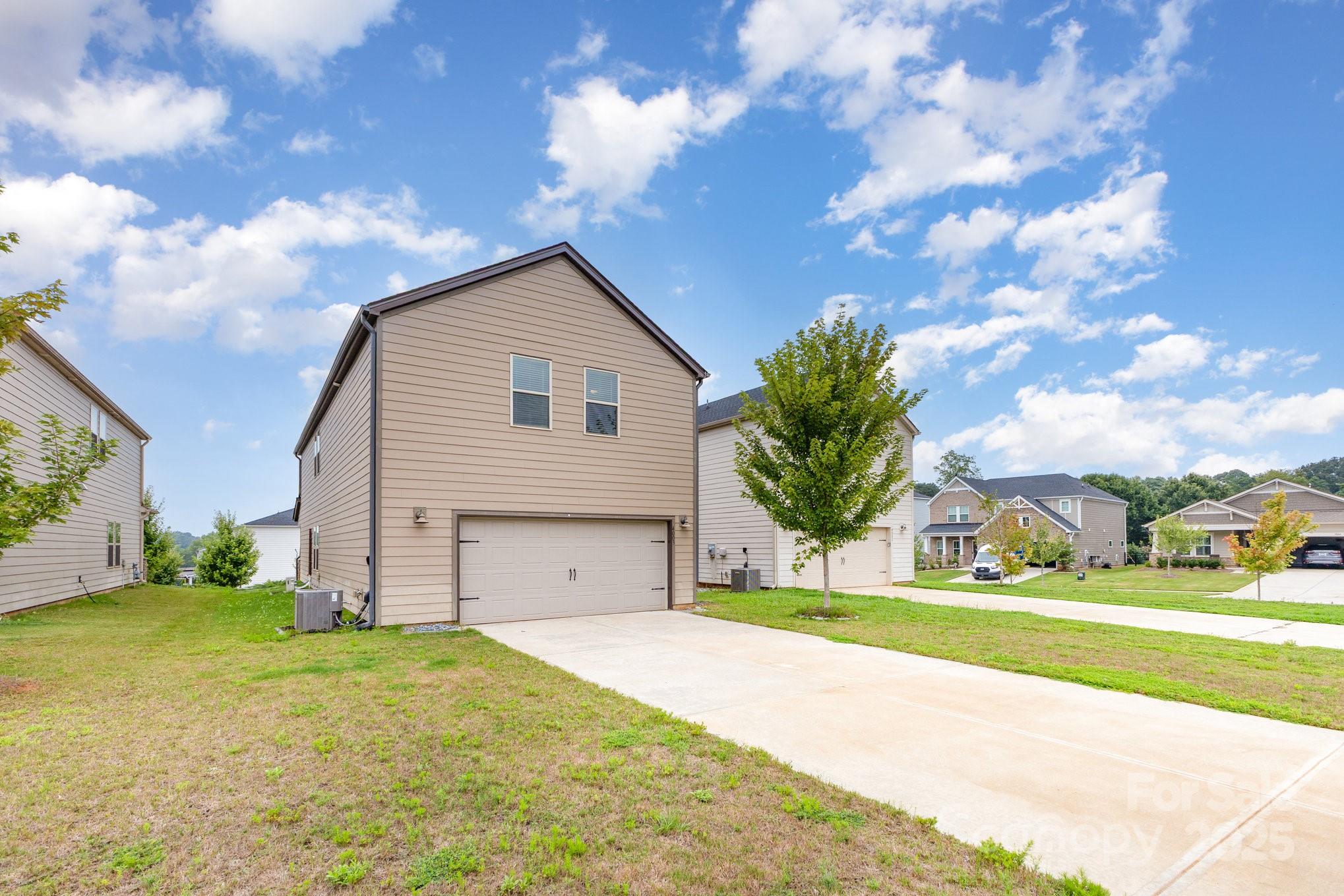 4003 Armstrong Farm Drive Belmont, NC 28012 - Photo 29 of 32 a view of a house with a backyard