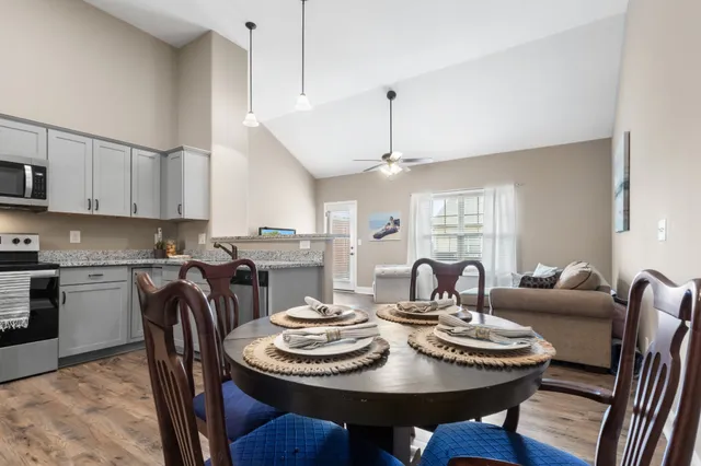 a view of a dining room with furniture