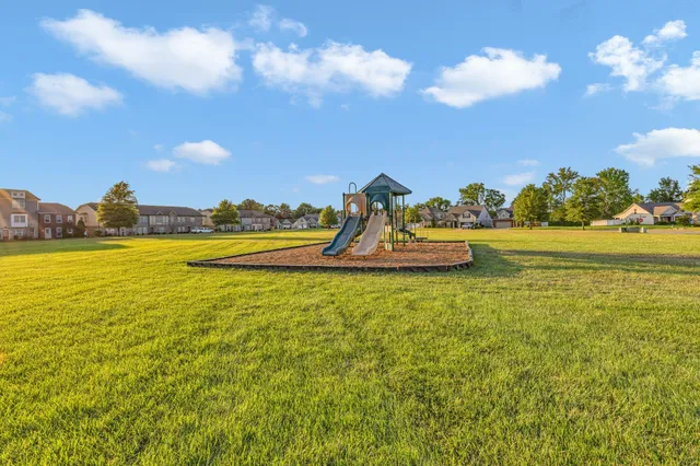 a view of a lake with a big yard