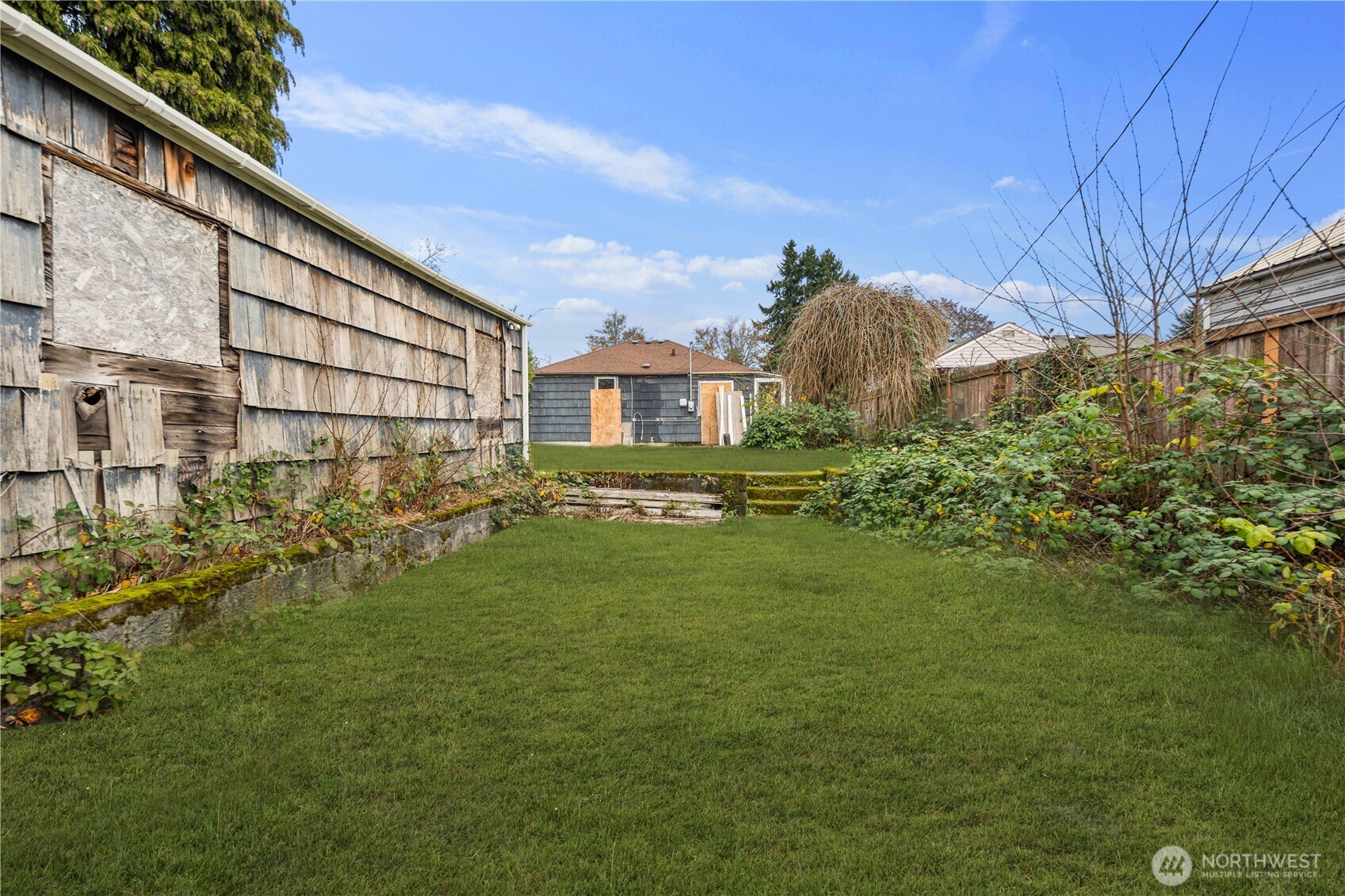 1218 South Ridgewood Avenue Tacoma, WA 98405 - Photo 19 of 24 a house view with garden space