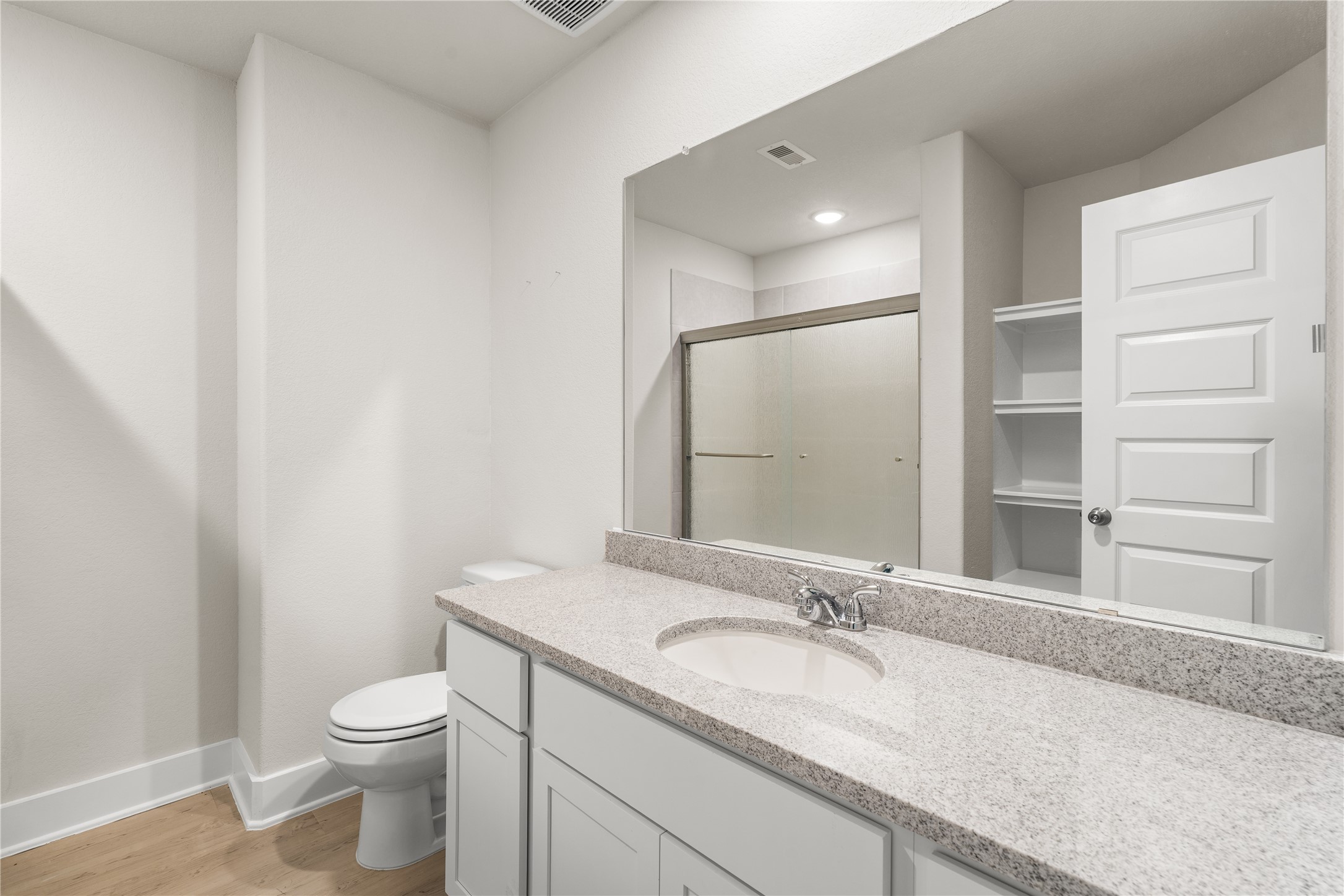 4001 Baja Lane Houston, TX 77045 - Photo 22 of 27 Designed to comfortably serve the secondary bedrooms, this full bath features generous counter space, built-in linen storage, and a layout that keeps daily routines running smoothly.