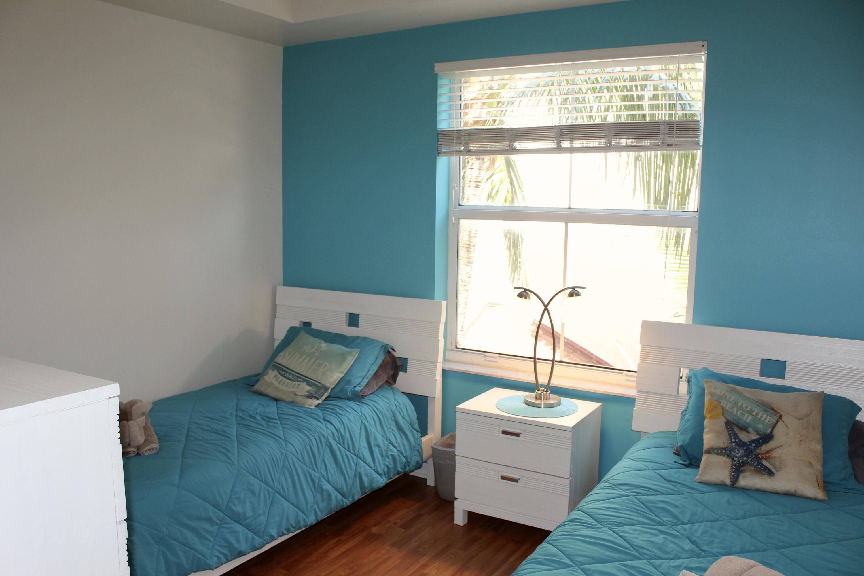 3302 Tuscany Way Boynton Beach, FL 33435 - Photo 27 of 62 a bedroom with a bed and window