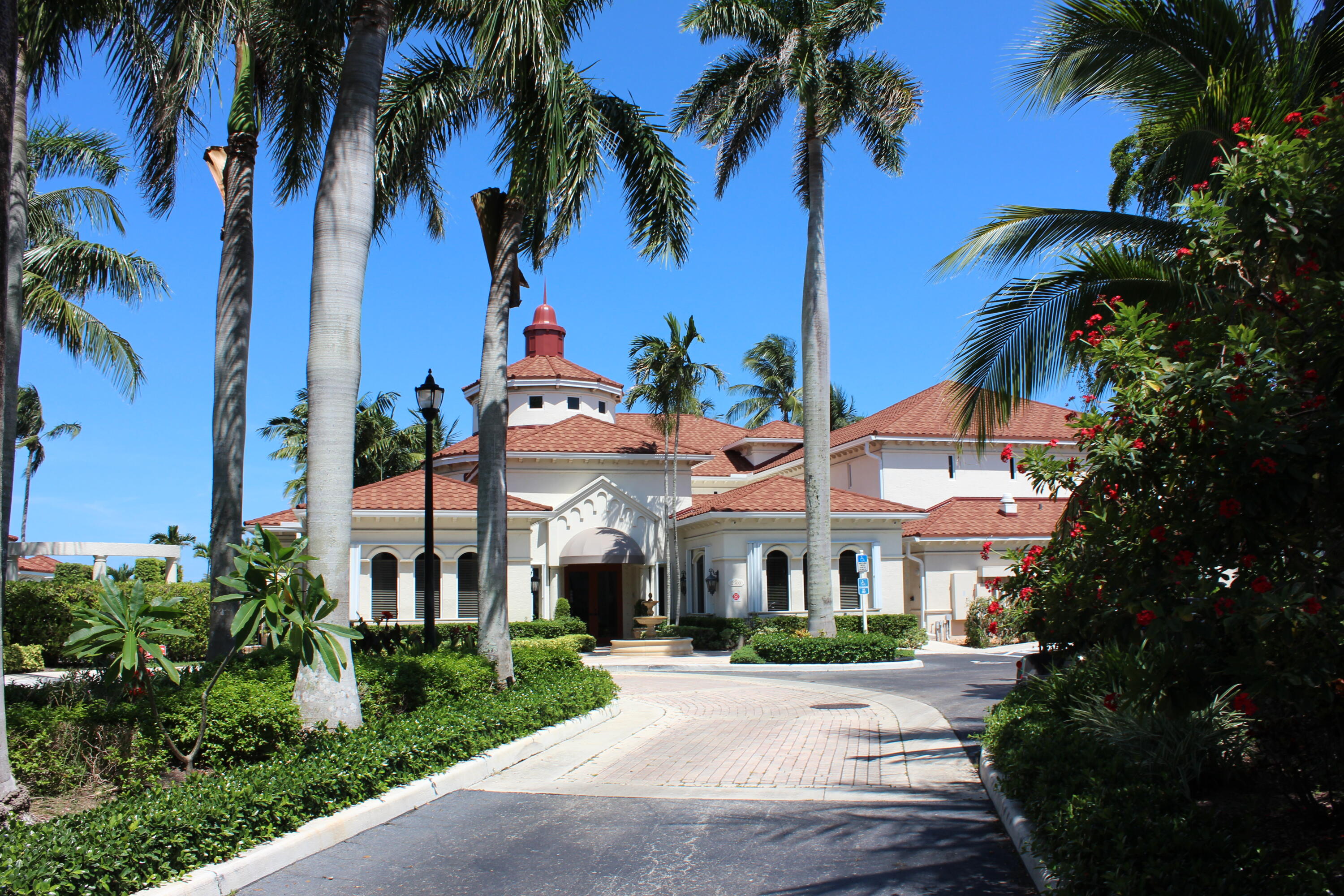 3302 Tuscany Way Boynton Beach, FL 33435 - Photo 3 of 62 front view of a house with a yard and palm trees