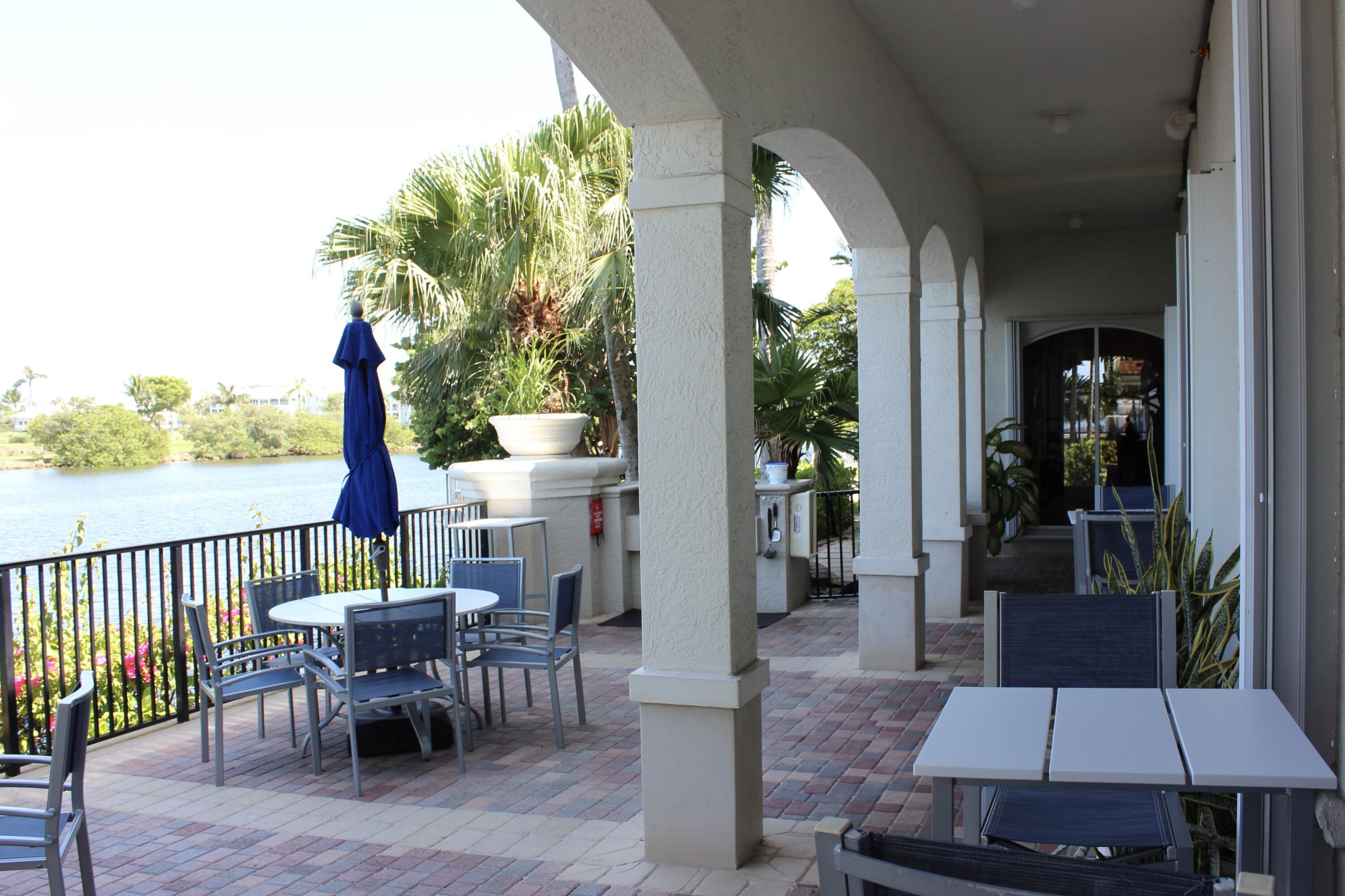 3302 Tuscany Way Boynton Beach, FL 33435 - Photo 44 of 62 an outdoor space with furniture