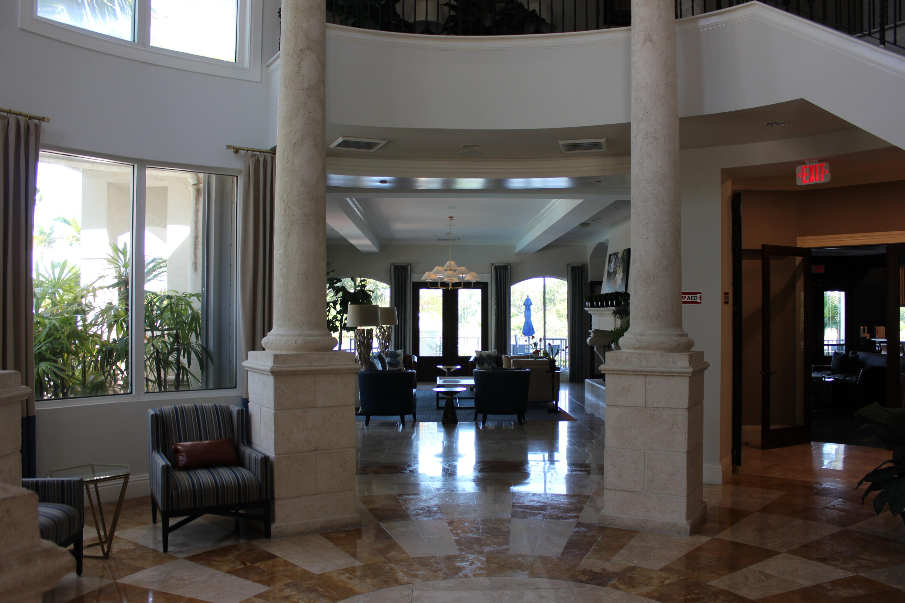 3302 Tuscany Way Boynton Beach, FL 33435 - Photo 49 of 62 a lobby with furniture and window