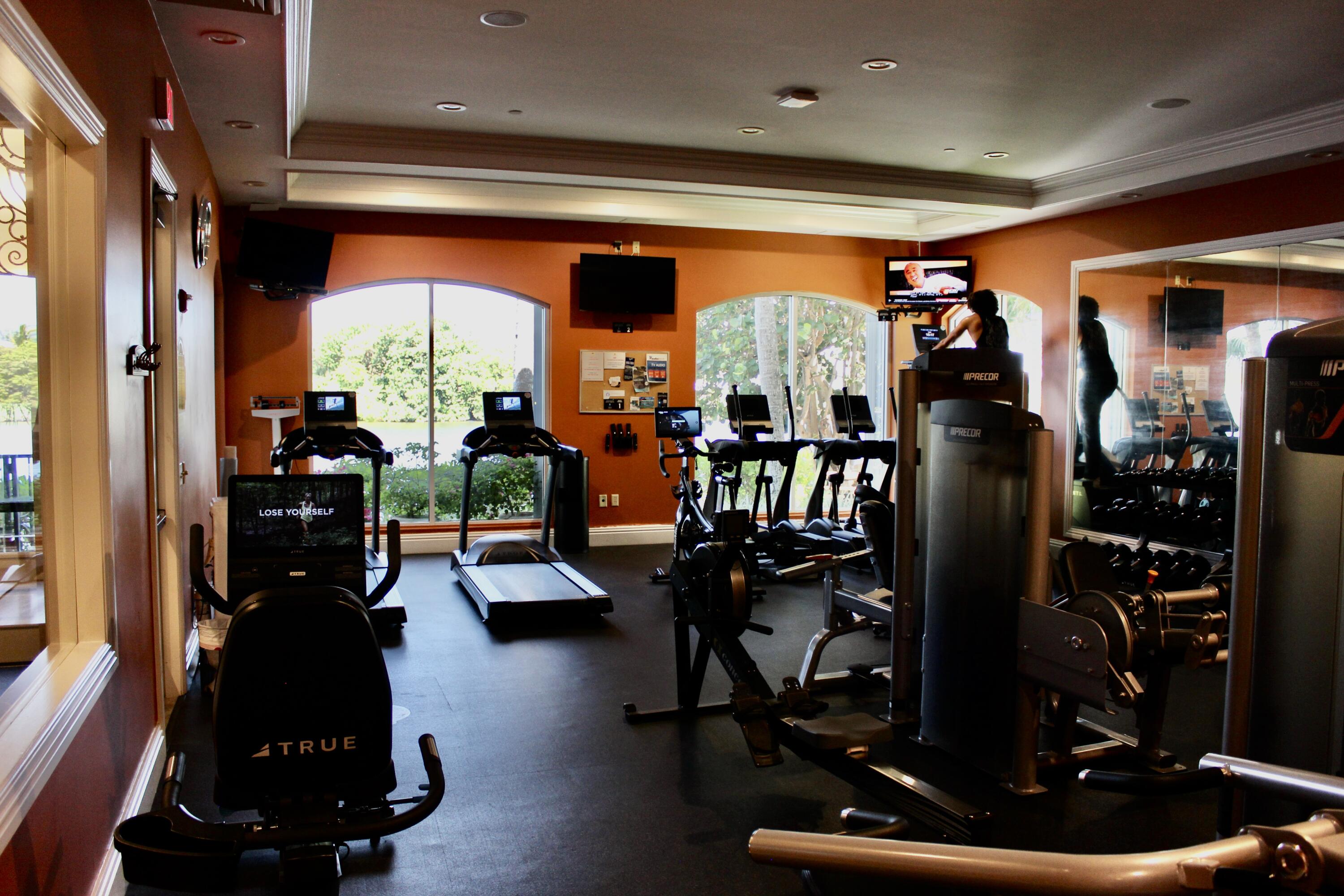 3302 Tuscany Way Boynton Beach, FL 33435 - Photo 50 of 62 a room with lots of gym equipment and a large window