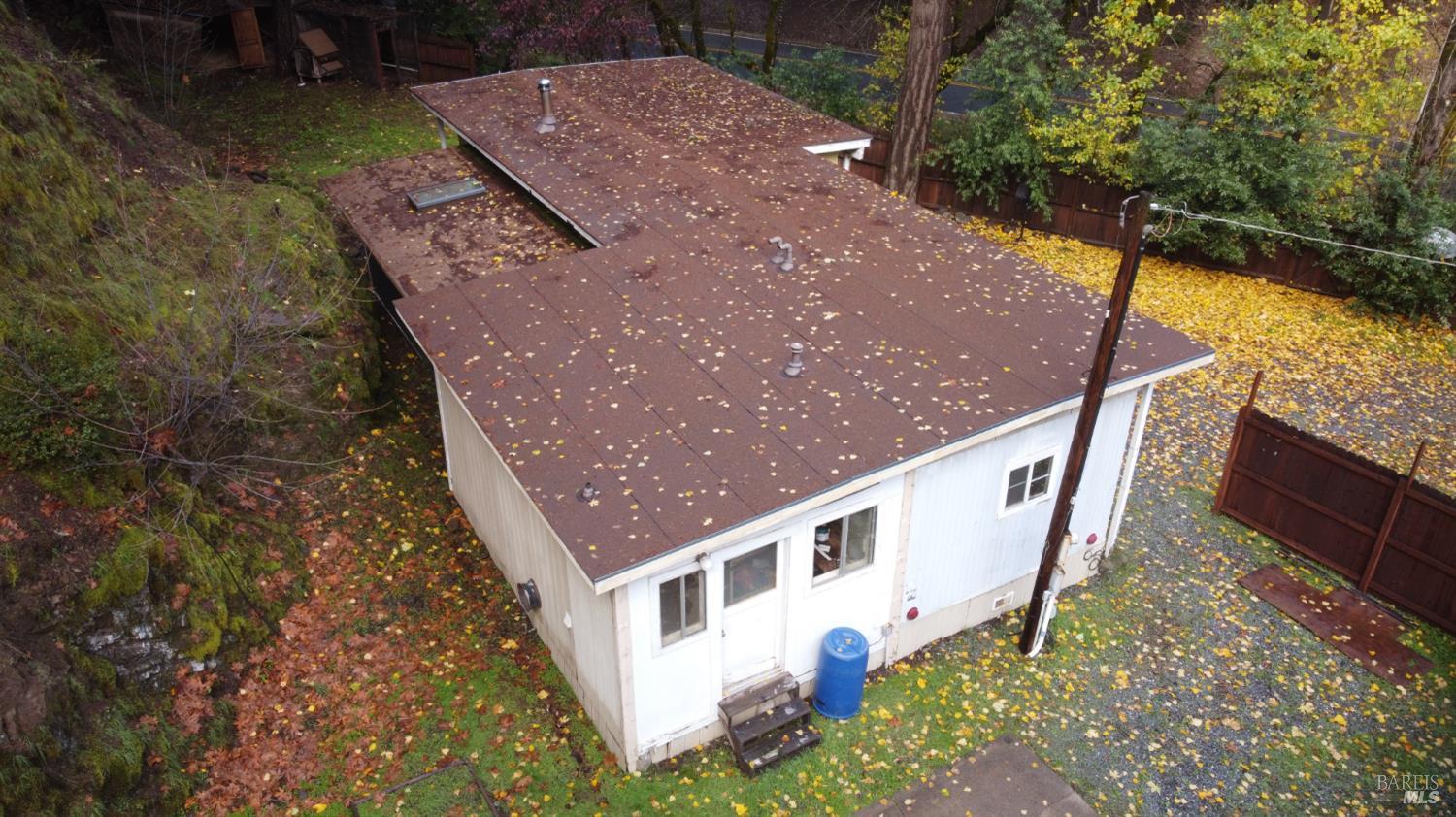 5011 Canyon Road Willits, CA 95490 - Photo 15 of 16 a view of a house with a yard