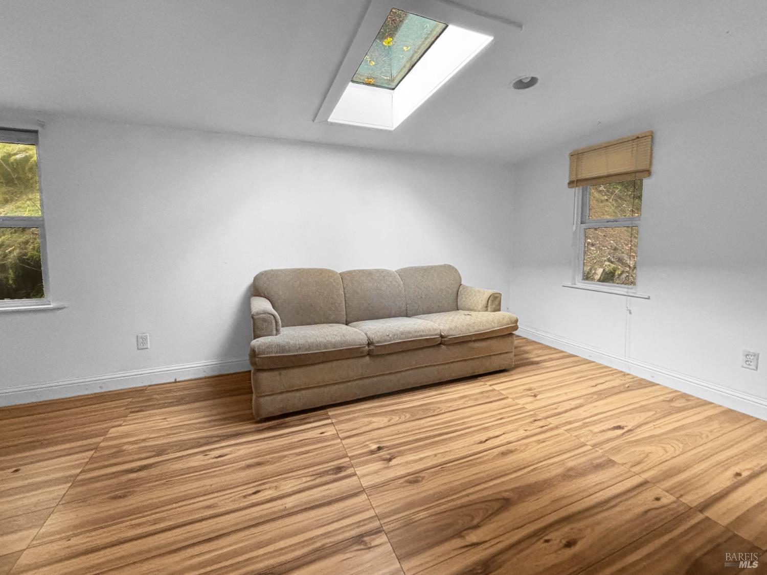 5011 Canyon Road Willits, CA 95490 - Photo 6 of 16 a bedroom with a bed and a couch