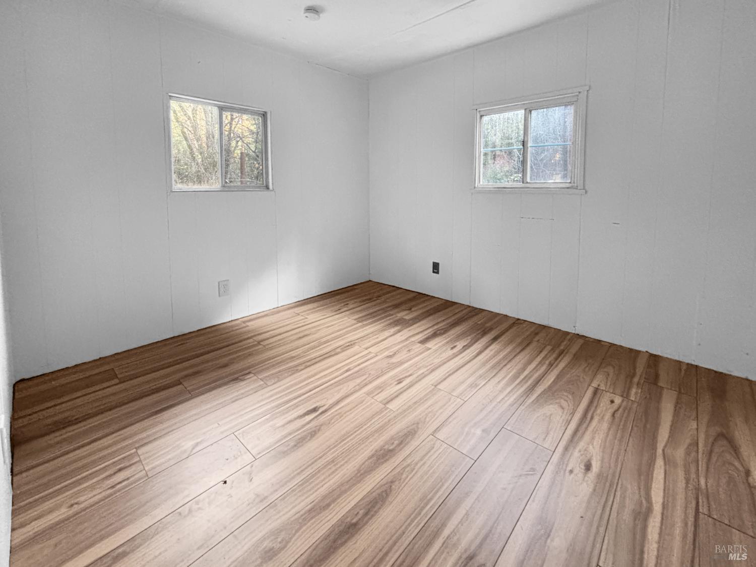 5011 Canyon Road Willits, CA 95490 - Photo 8 of 16 a view of empty room with wooden floor