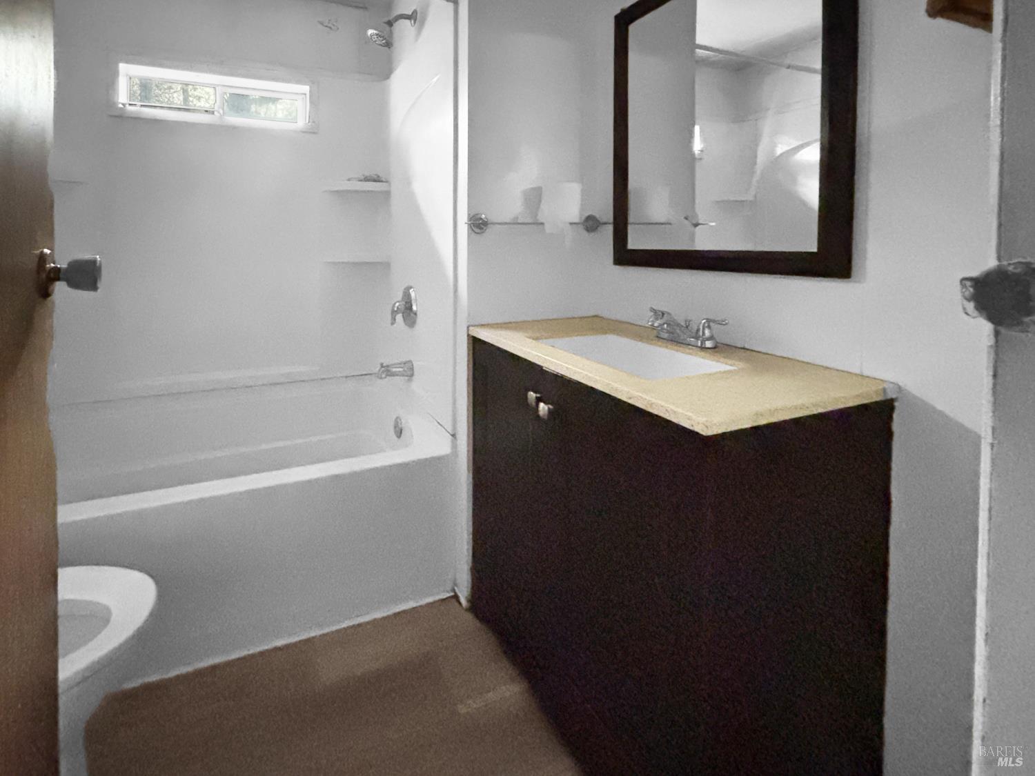 5011 Canyon Road Willits, CA 95490 - Photo 10 of 16 a bathroom with a bathtub sink vanity and mirror