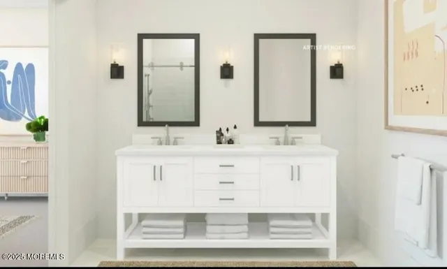 a bathroom with a sink vanity and mirror