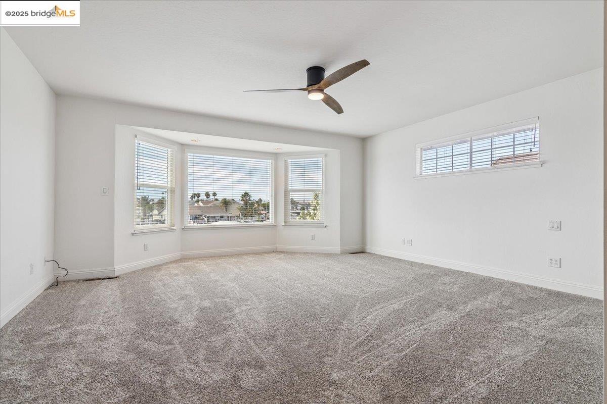 5752 Drakes Drive Discovery Bay, CA 94505 - Photo 16 of 32 a view of an empty room with a window