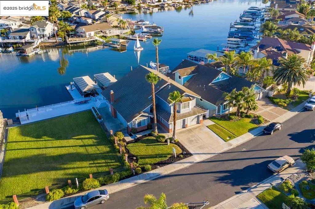 5752 Drakes Drive Discovery Bay, CA 94505 - Photo 2 of 32 an aerial view of a house with a ocean view