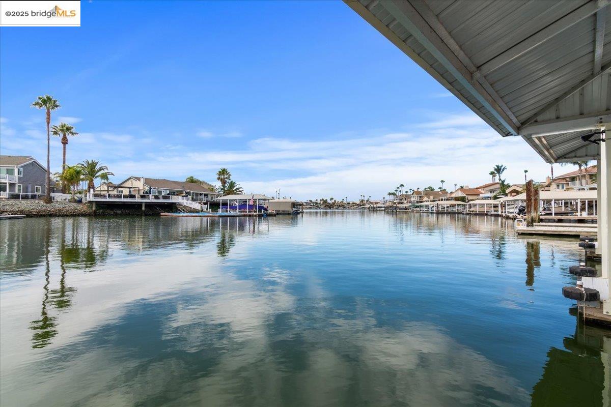 5752 Drakes Drive Discovery Bay, CA 94505 - Photo 29 of 32 a view of a lake with houses