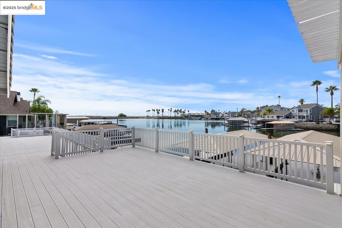 5752 Drakes Drive Discovery Bay, CA 94505 - Photo 4 of 32 Wooden deck with a water view and a residential view
