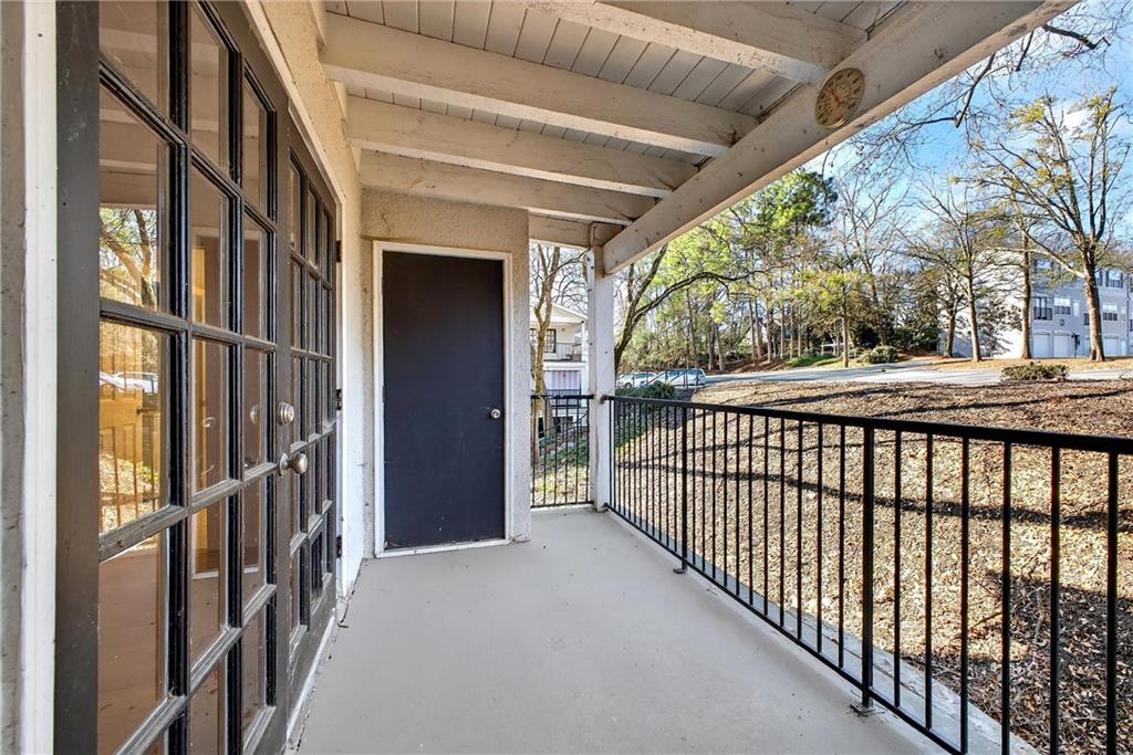 1150 Collier Road Northwest, Unit K9 Atlanta, GA 30318 - Photo 19 of 28 a view of a porch