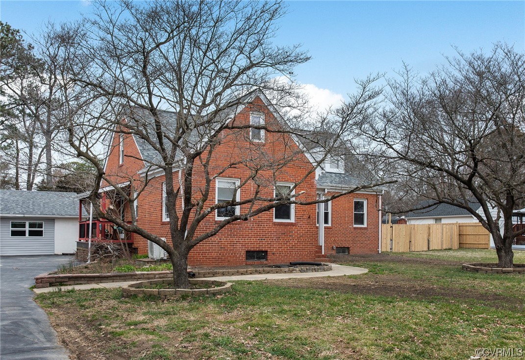 5920 Brookfield Road Richmond, VA 23227 - Photo 2 of 35 View of front of house with a front lawn