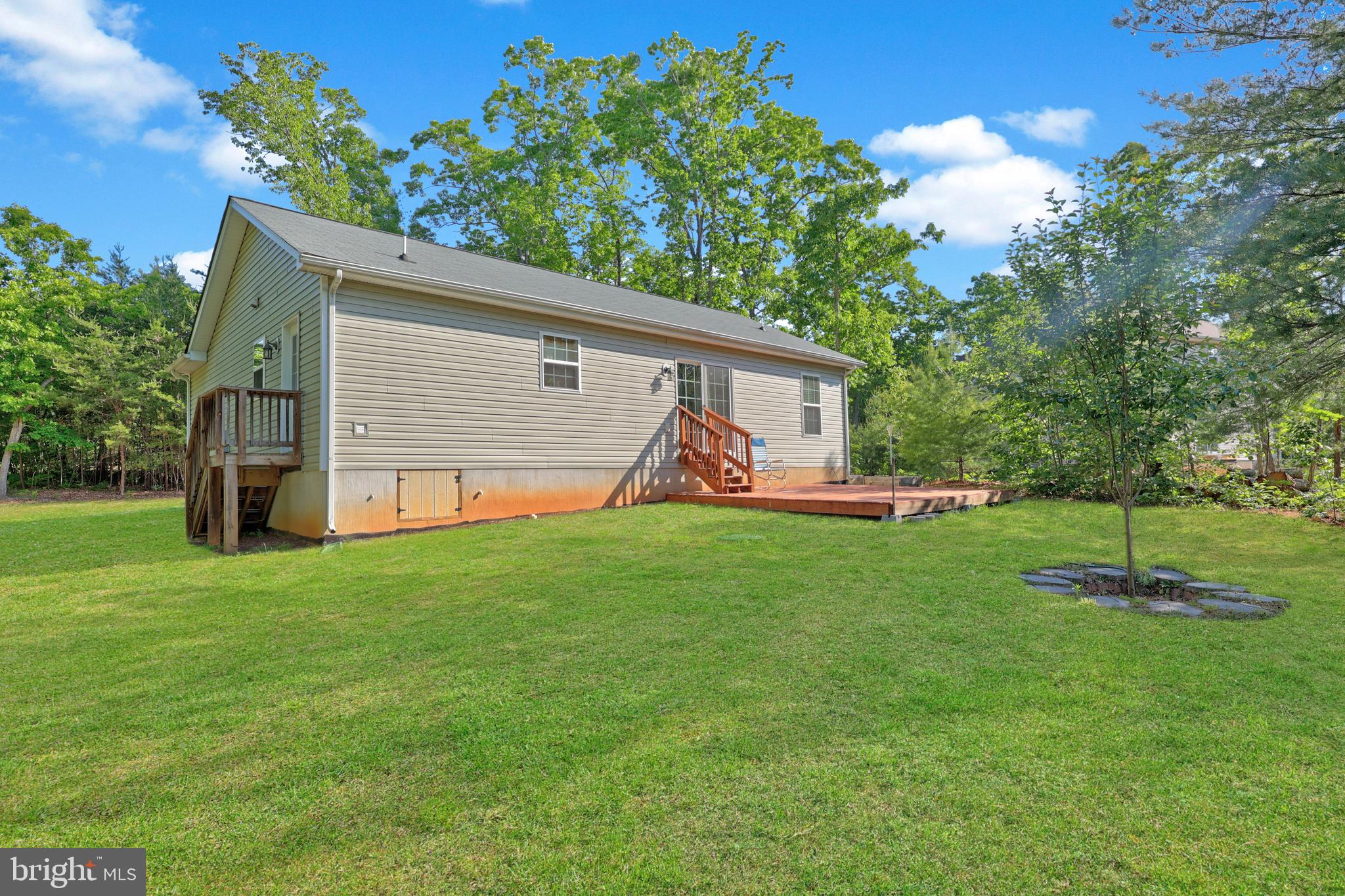 470 Jacoby Road Louisa, VA 23093 - Photo 12 of 16 a front view of house with yard and green space
