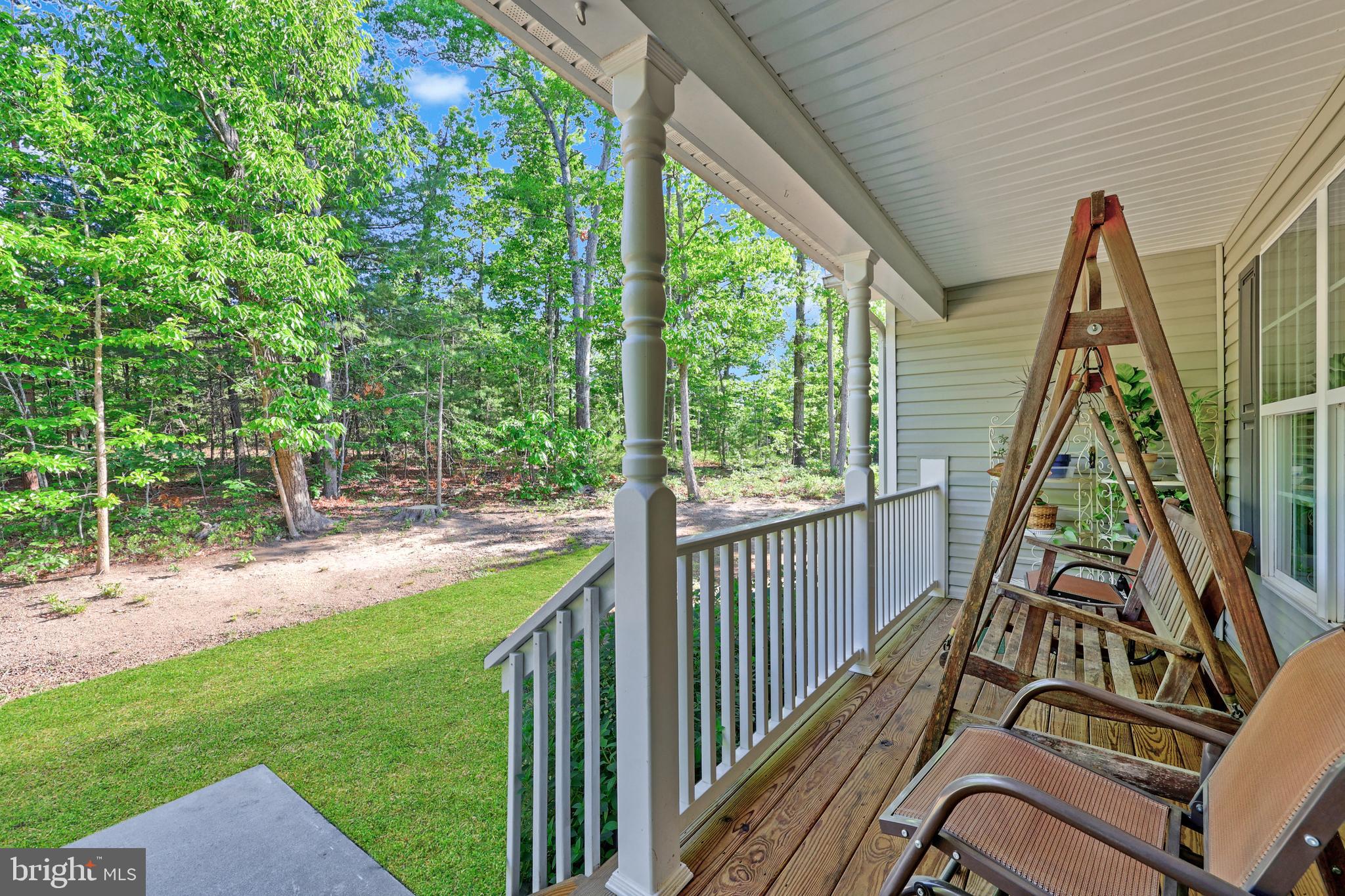 470 Jacoby Road Louisa, VA 23093 - Photo 3 of 16 a view of a pathway of a house with backyard and deck