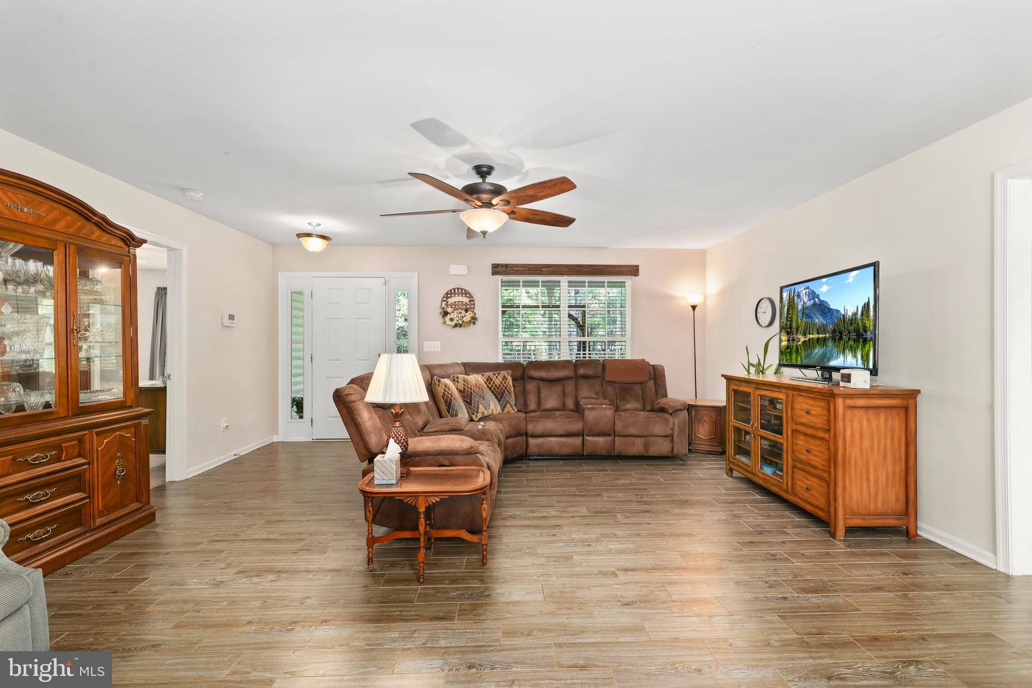 470 Jacoby Road Louisa, VA 23093 - Photo 6 of 16 a living room with furniture and a wooden floor