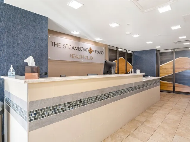 a view of a living room and bathroom