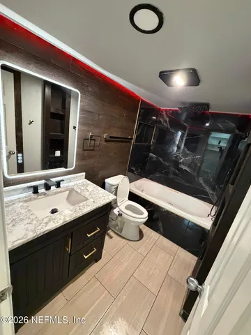 a front view of a house with swimming pool