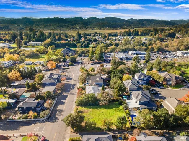 an aerial view of residential building with parking space