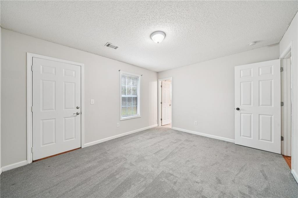 480 Raider Way Bethlehem, GA 30620 - Photo 19 of 30 a view of an empty room with a window